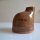 Bottle vase with an off-centre neck in ceramic, signature with a fish to be identified.
