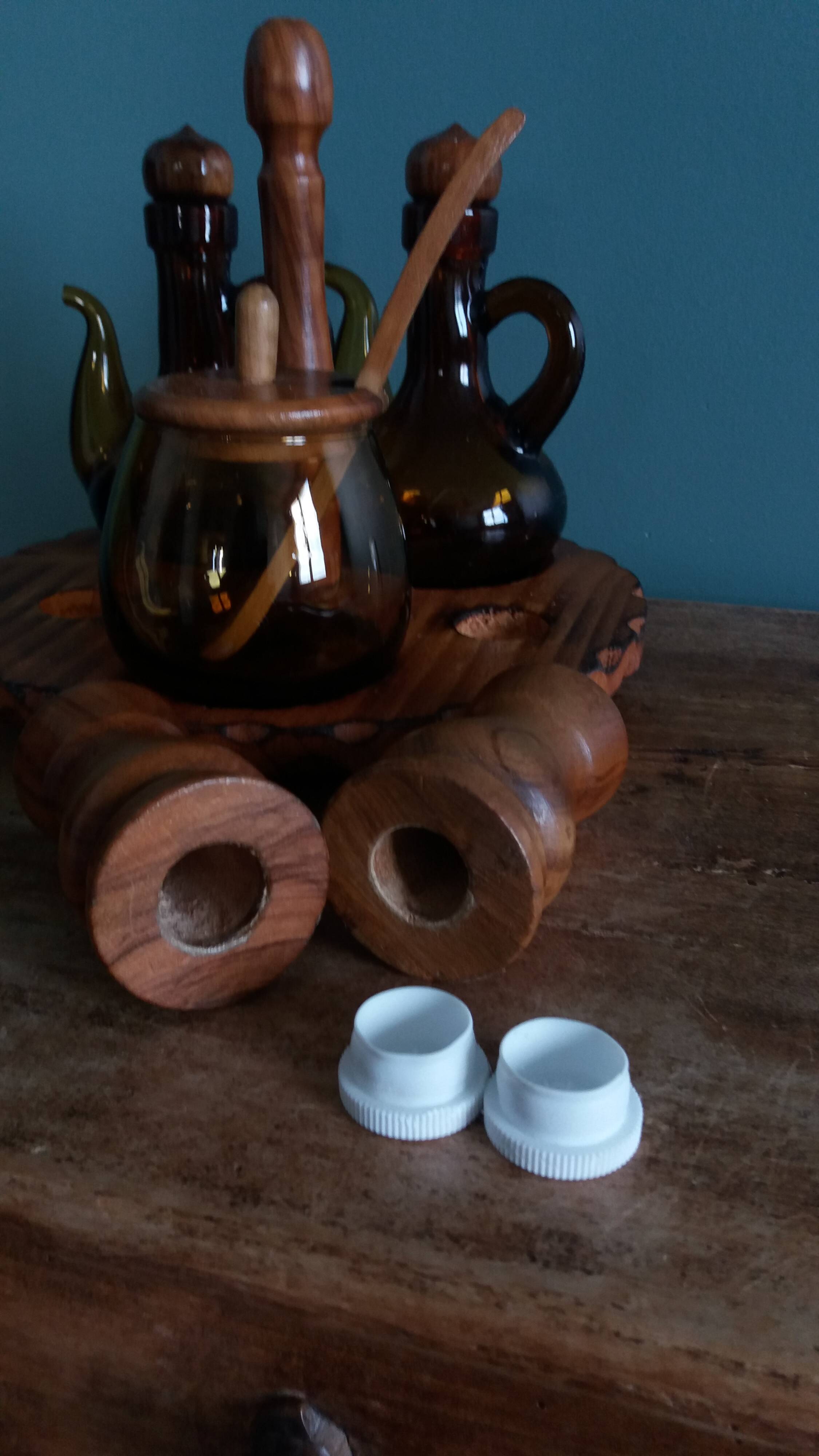 Oil, vinegar, mustard, pepper, salt, olive wood servant from Spain.