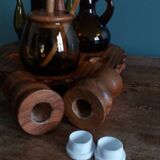Oil, vinegar, mustard, pepper, salt, olive wood servant from Spain.
