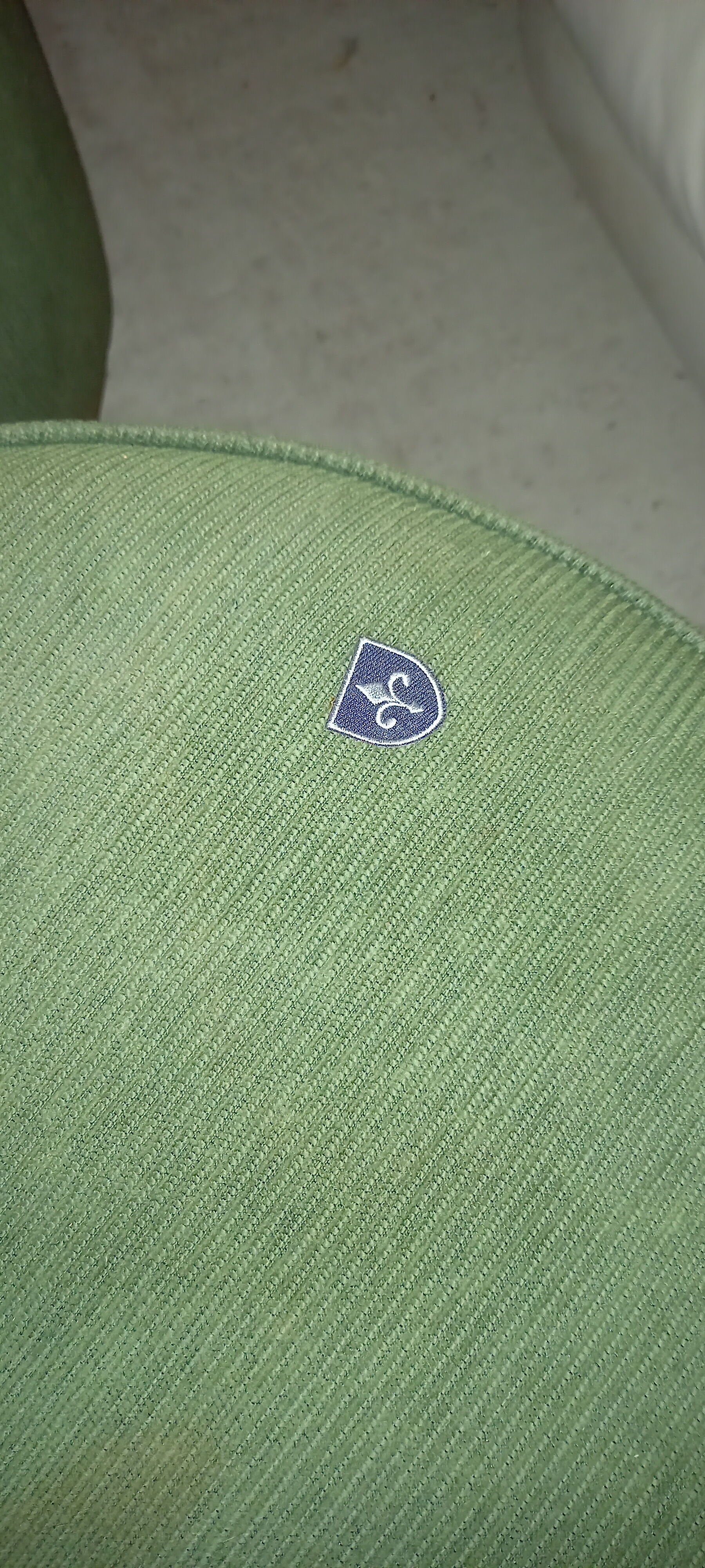 English green velvet pouf