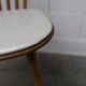 Pair of Baumann Menuet chairs, Honey patina, White skai seat