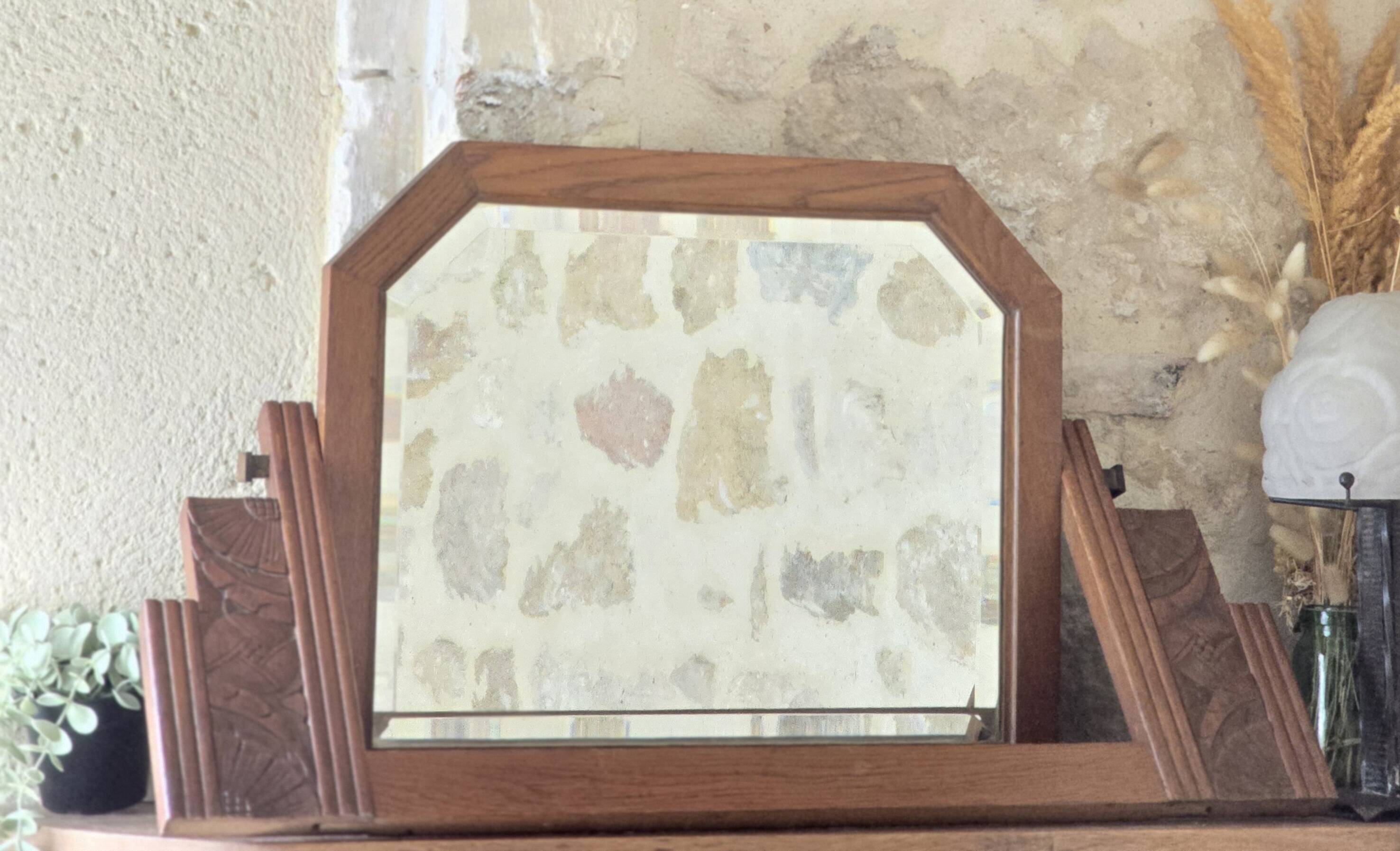 Art Deco pivoting mirror in solid wood from the 1930s.