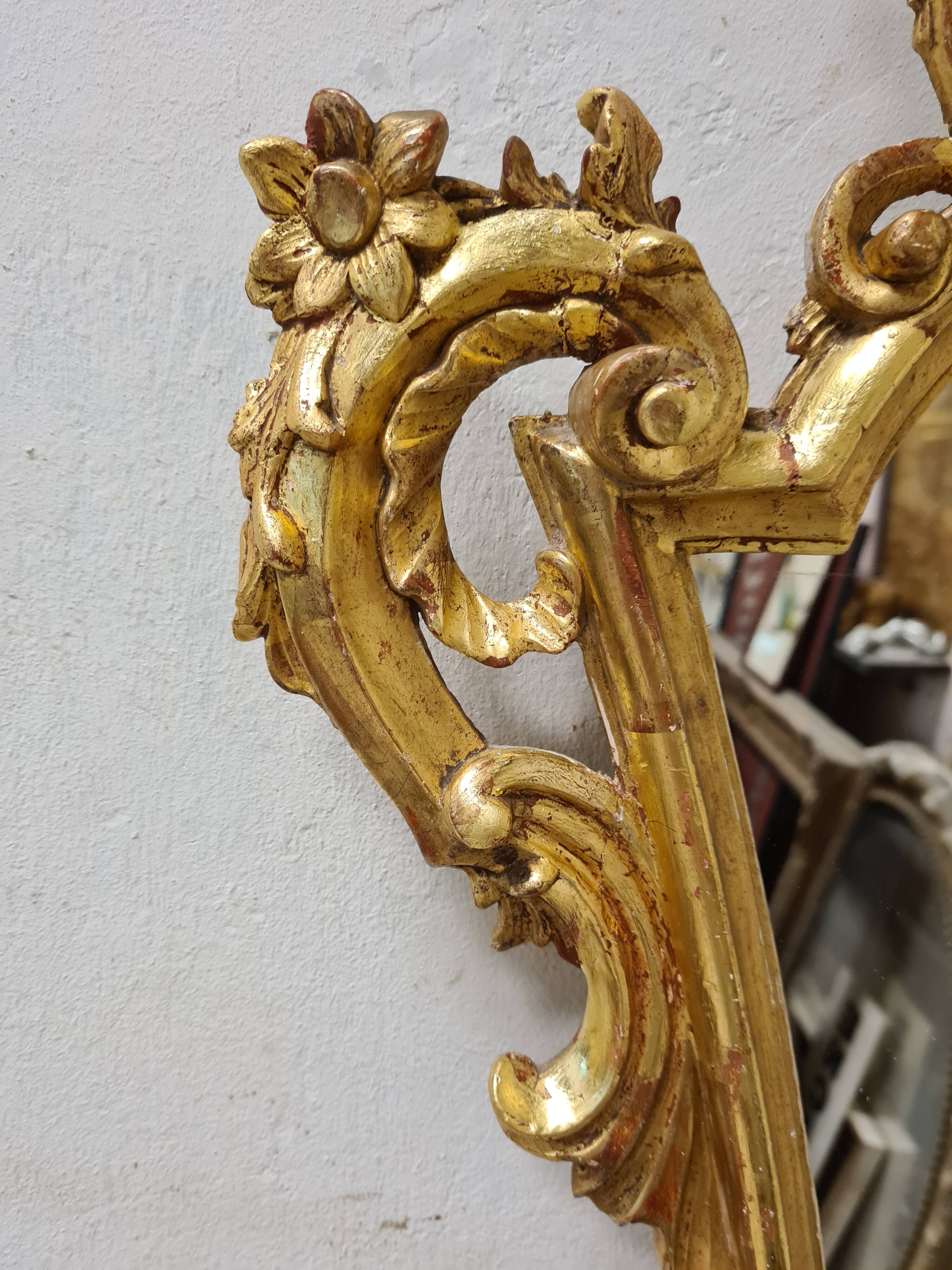 Antique baroque gilded mirror in carved wood, 18th century