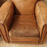 Pair of Art Deco leather club armchairs from the 1930s.