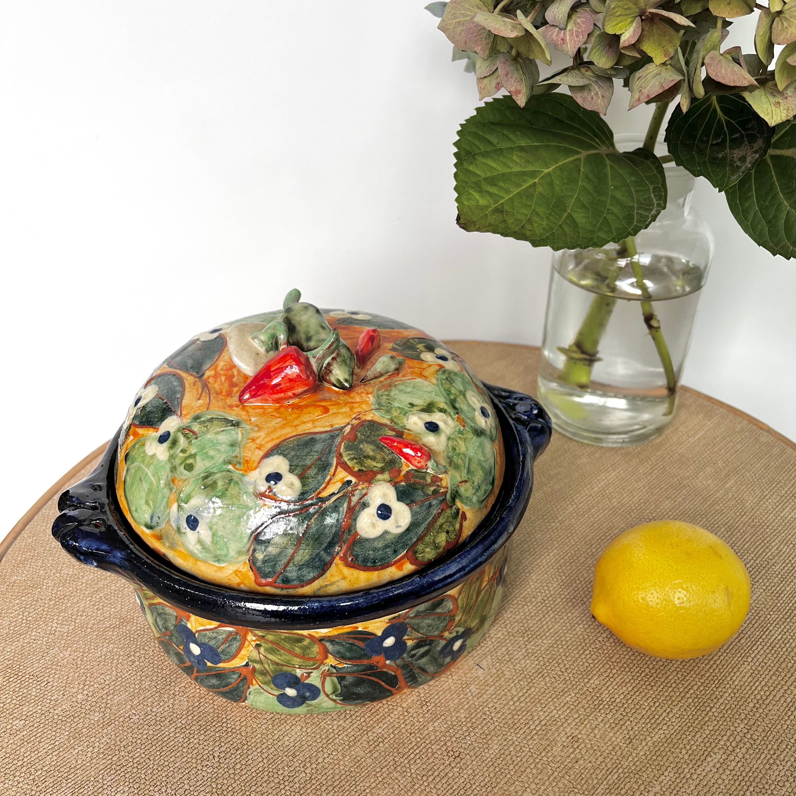 Old vegetable tureen in glazed terracotta