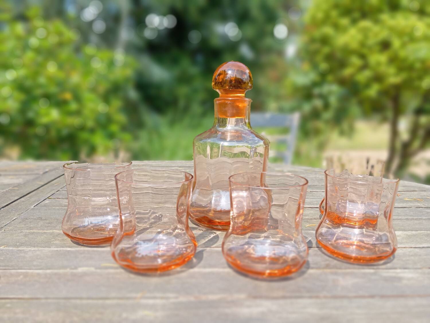 Retro whiskey set with pink glass, decanter and 5 glasses