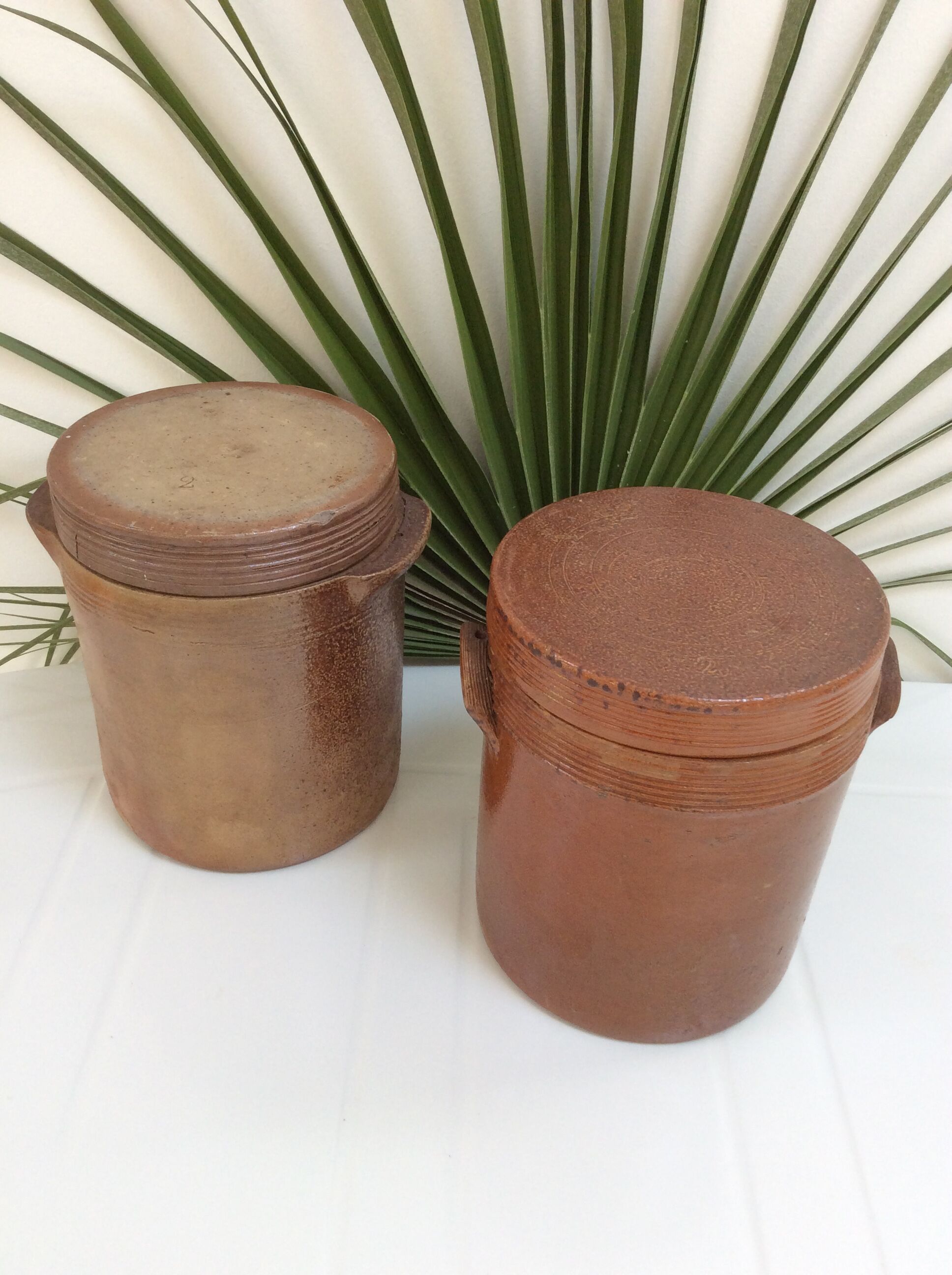 Old stoneware pot with lid