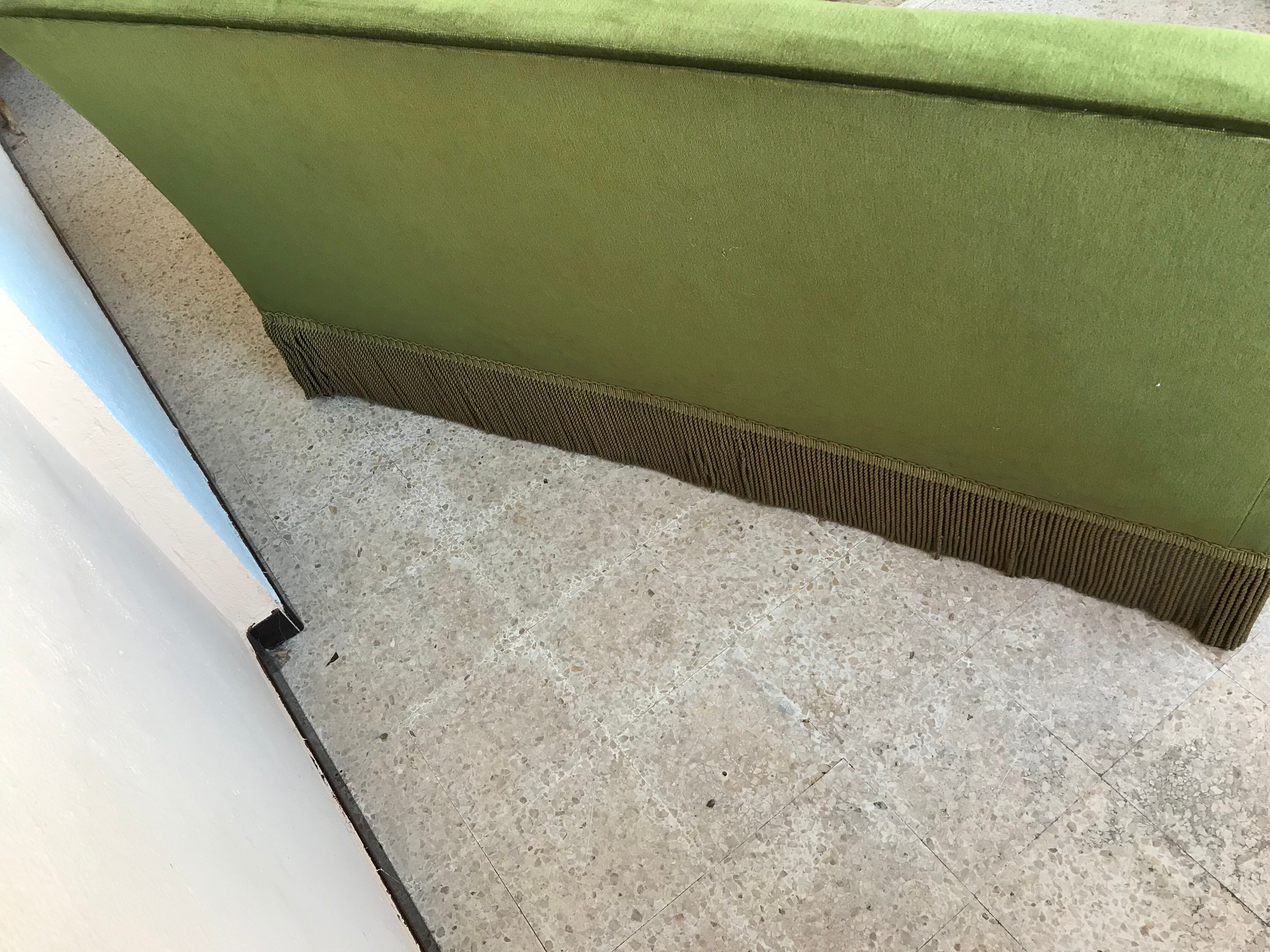 Vintage sofa in green velvet