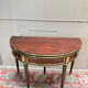 Half-moon table in mahogany from the Louis XVI period, 18th century.