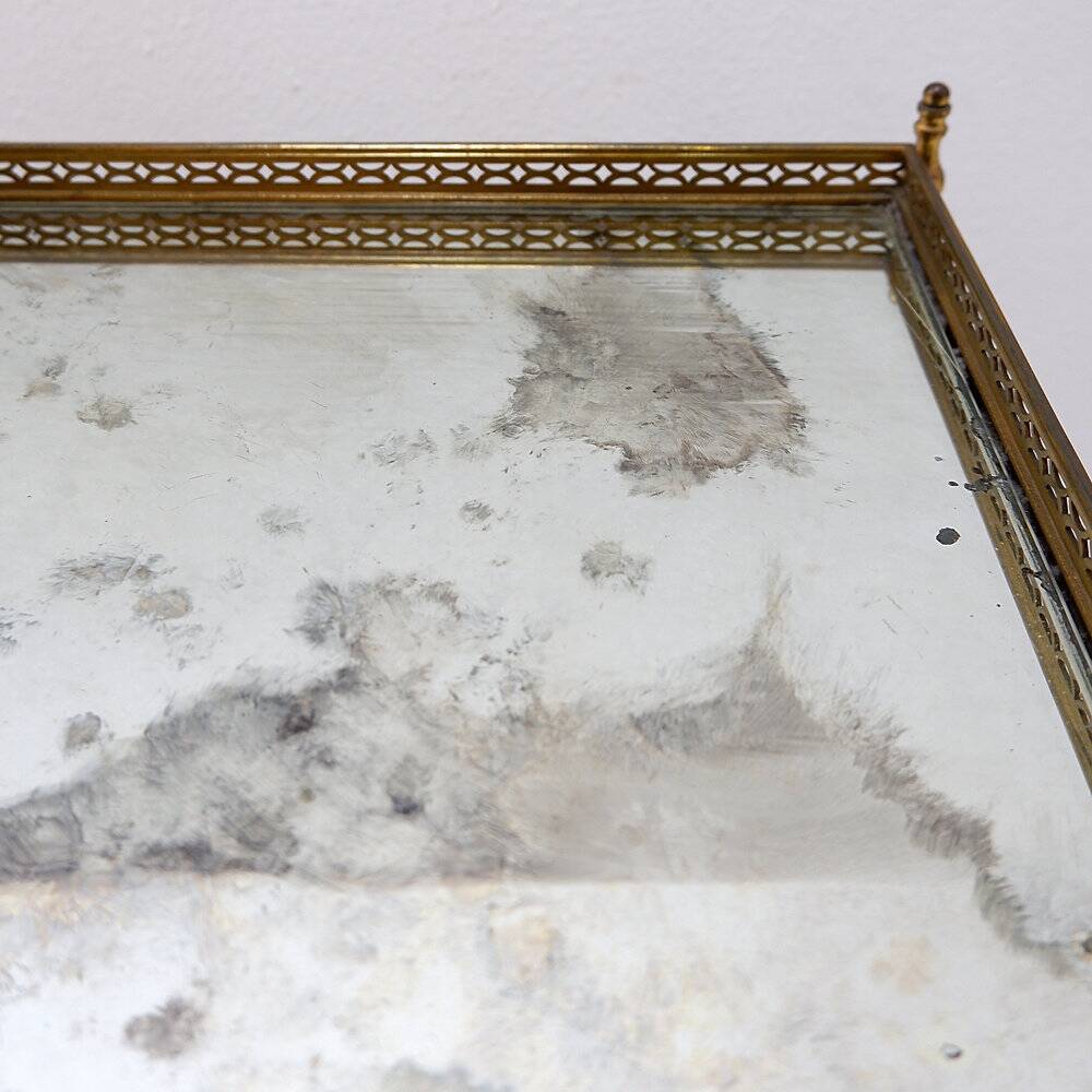 Two-tier side table with eglomisé mirror by Maison Jansen, French.