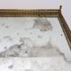 Two-tier side table with eglomisé mirror by Maison Jansen, French.