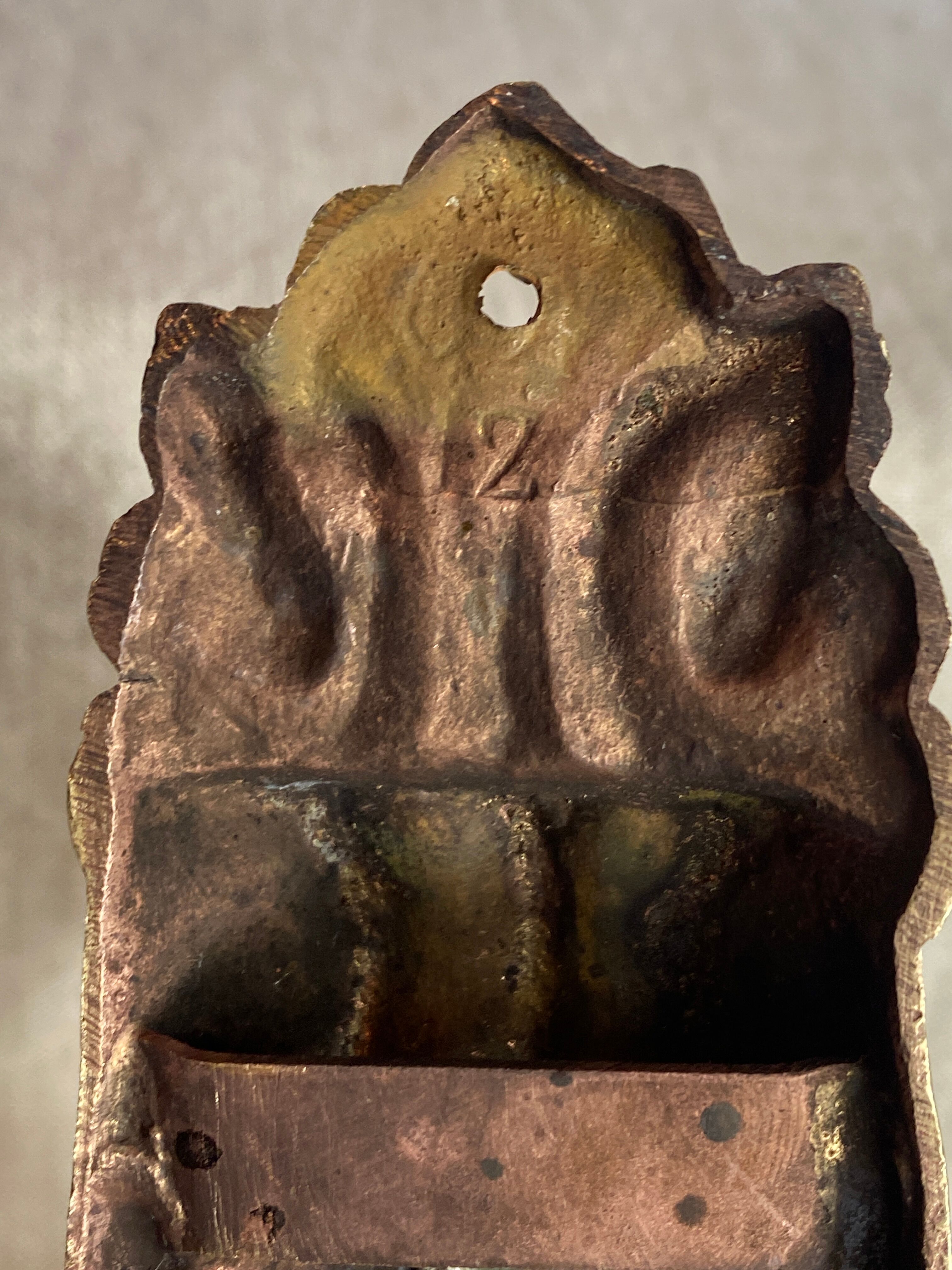 Golden bronze coat hook, 19th century