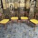 Suite de 4 chaises scandinaves skaï jaune