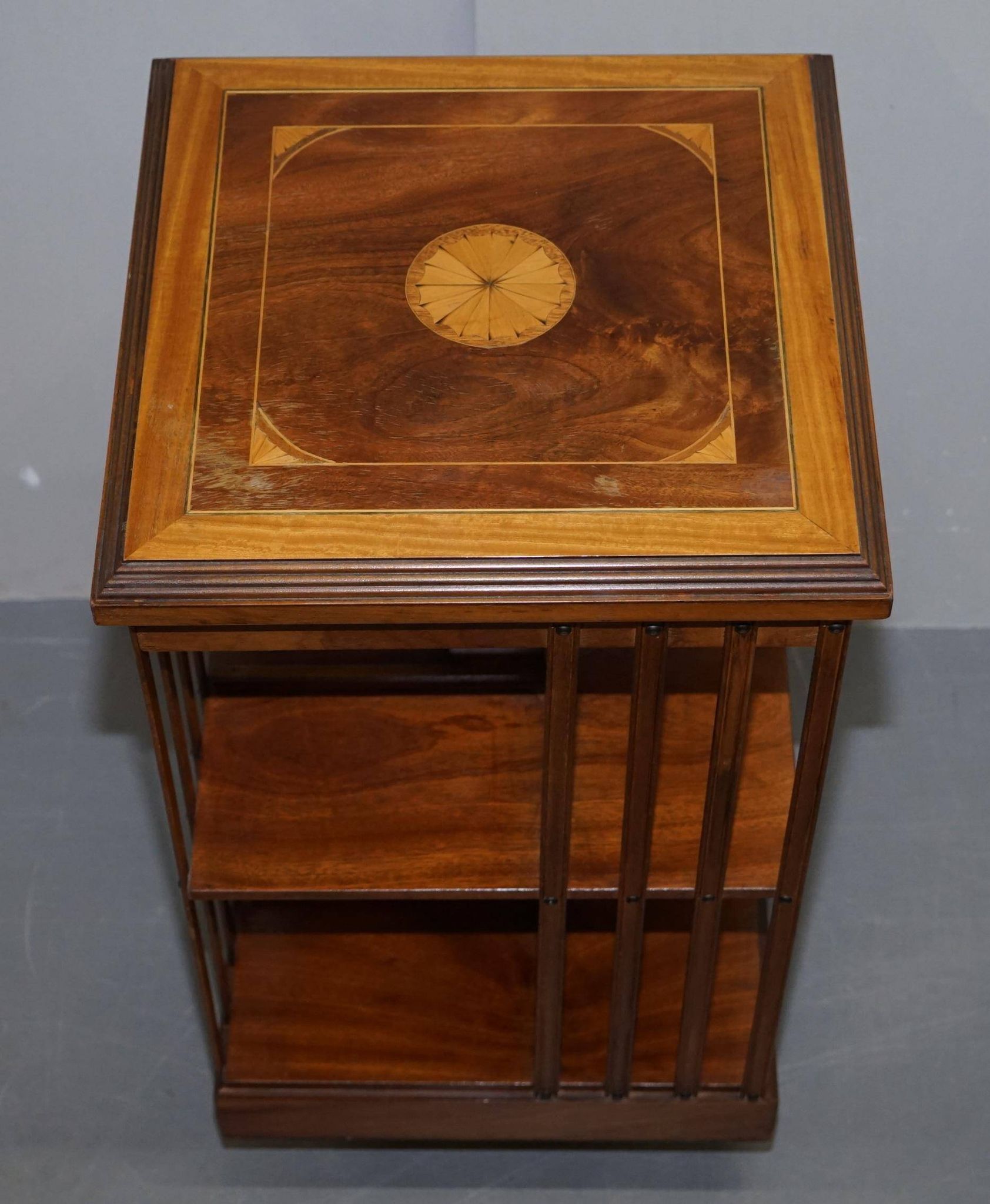 Edwardian revolving library in burl walnut with Sheraton inlay circa 1900