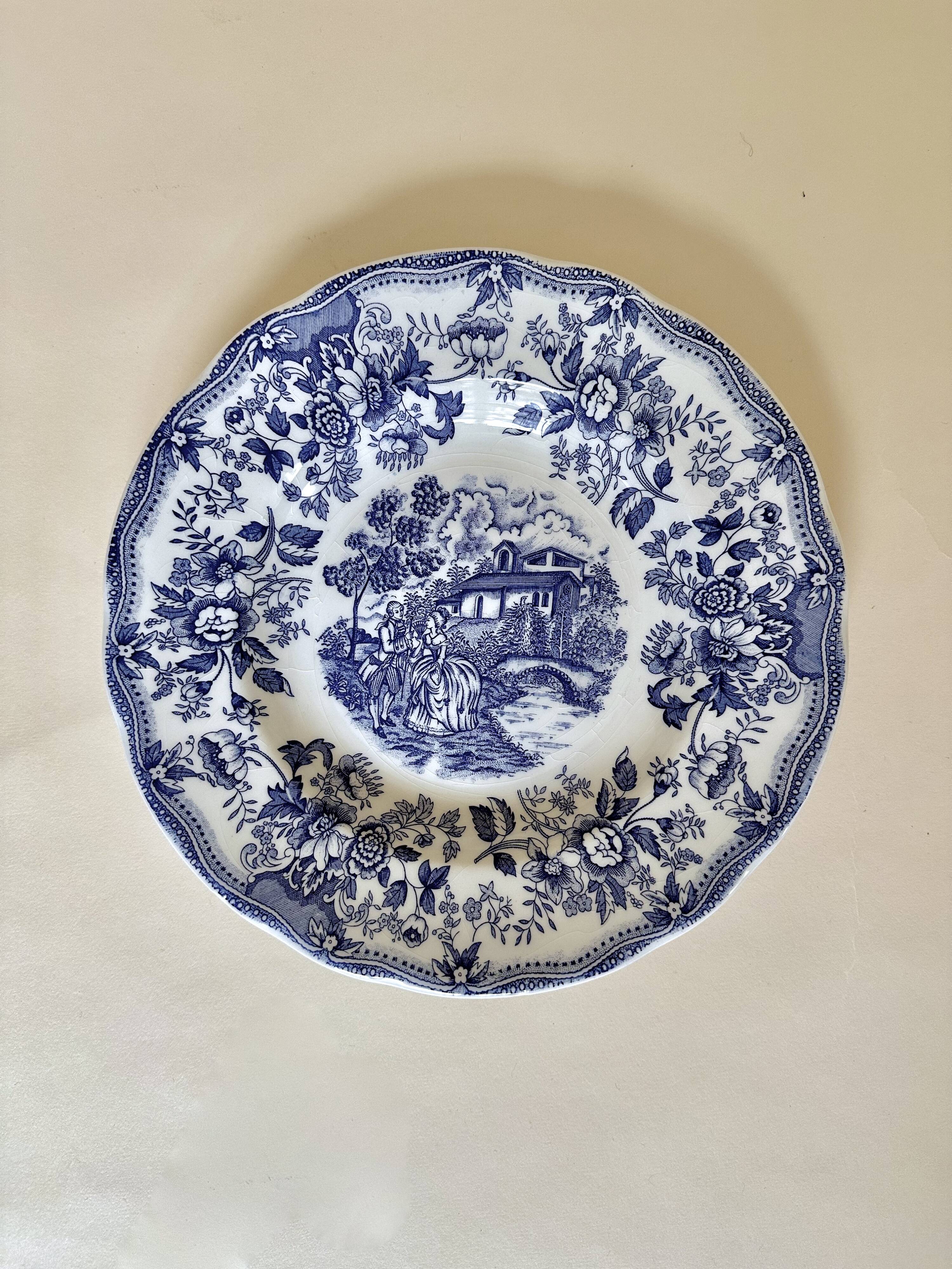 Set of five English deep plates, made of ironstone ceramic, romantic scene.