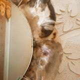 Sun mirror with mother-of-pearl circumference