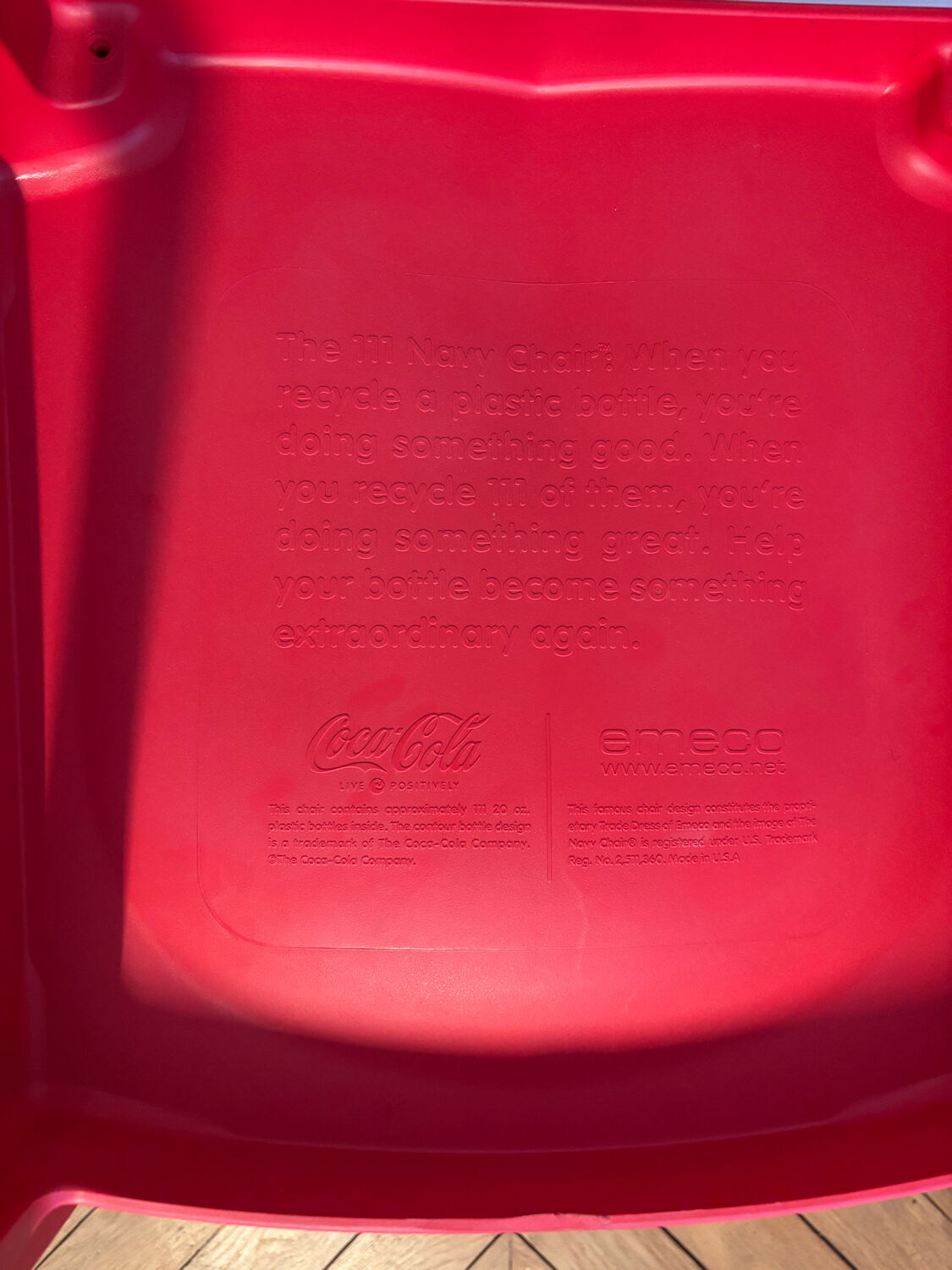 Set of 6 red Emeco chairs