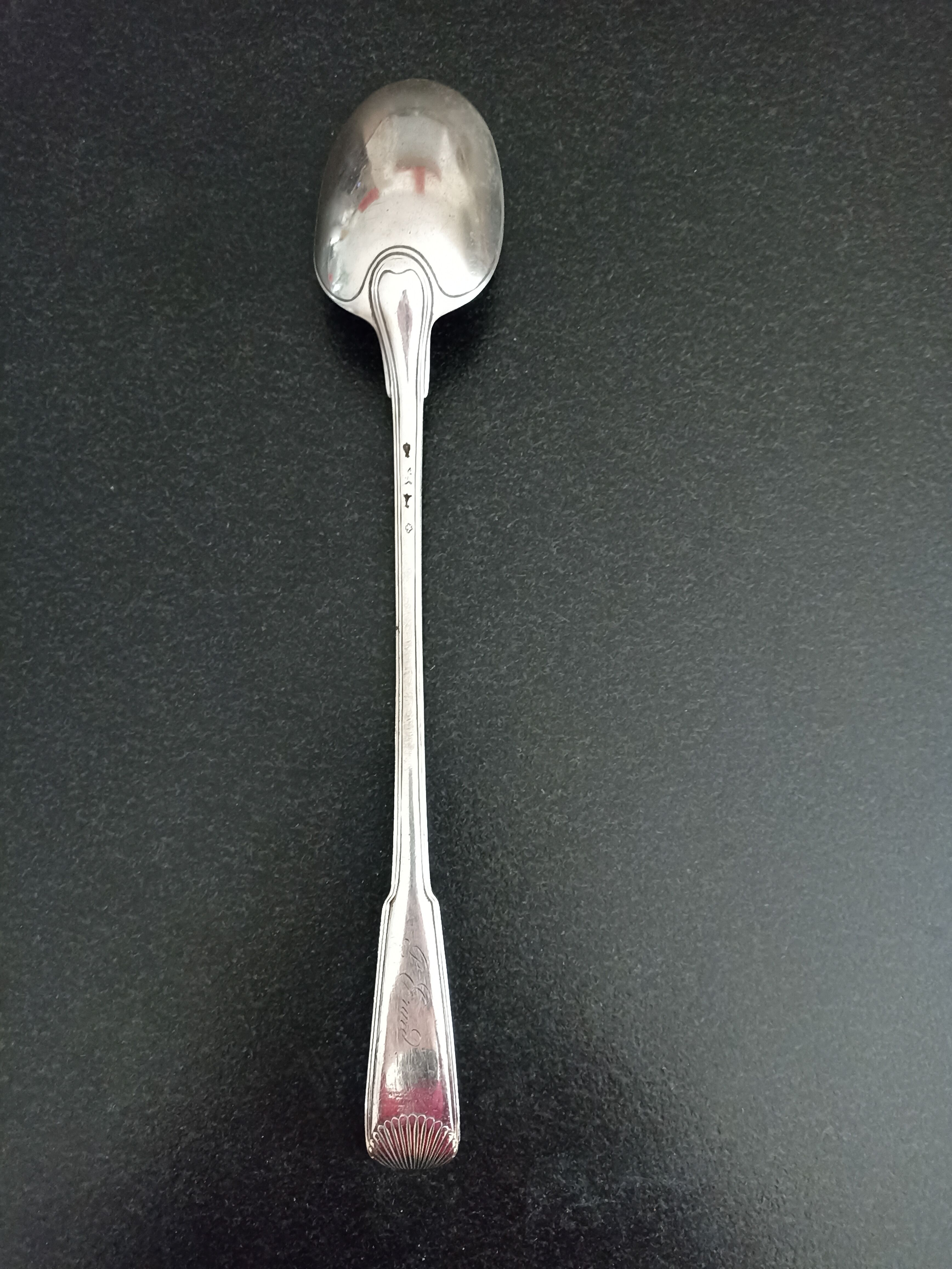 Silver metal serving spoon