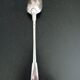 Silver metal serving spoon