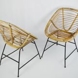 A pair of wicker chairs, 1970s