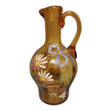 Old enamelled pitcher