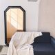 Octagonal mirror in lacquered black wood and brass - mirror smoked glass pink gold
