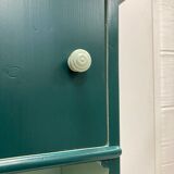 Two-door green bedside table