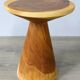 Minimalist side table in solid suar wood with conical legs.
