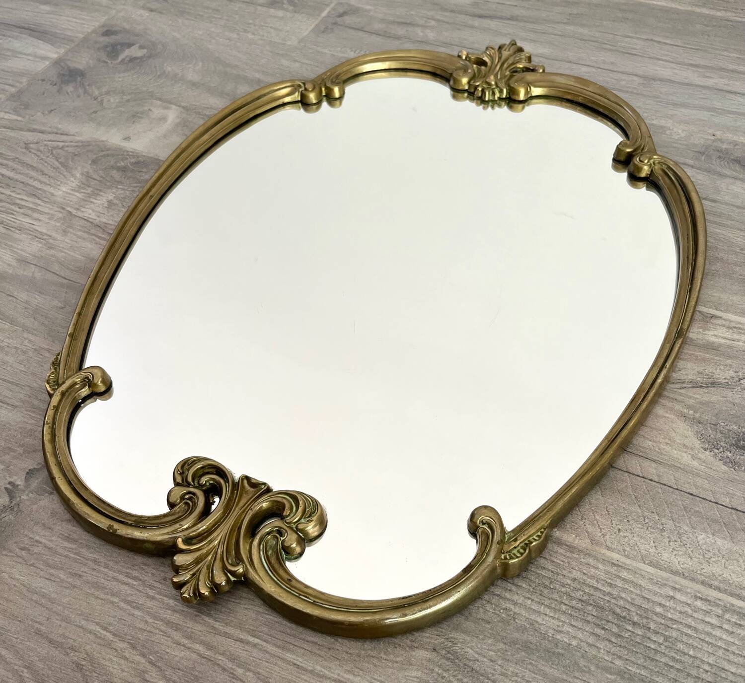 Vintage and rare gilt brass medallion/oblong/olave/rococo mirror