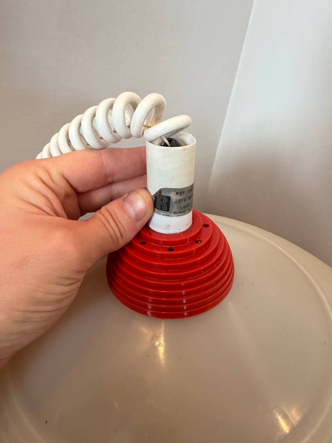 Suspension design Memphis red and white vintage model from the 80s.