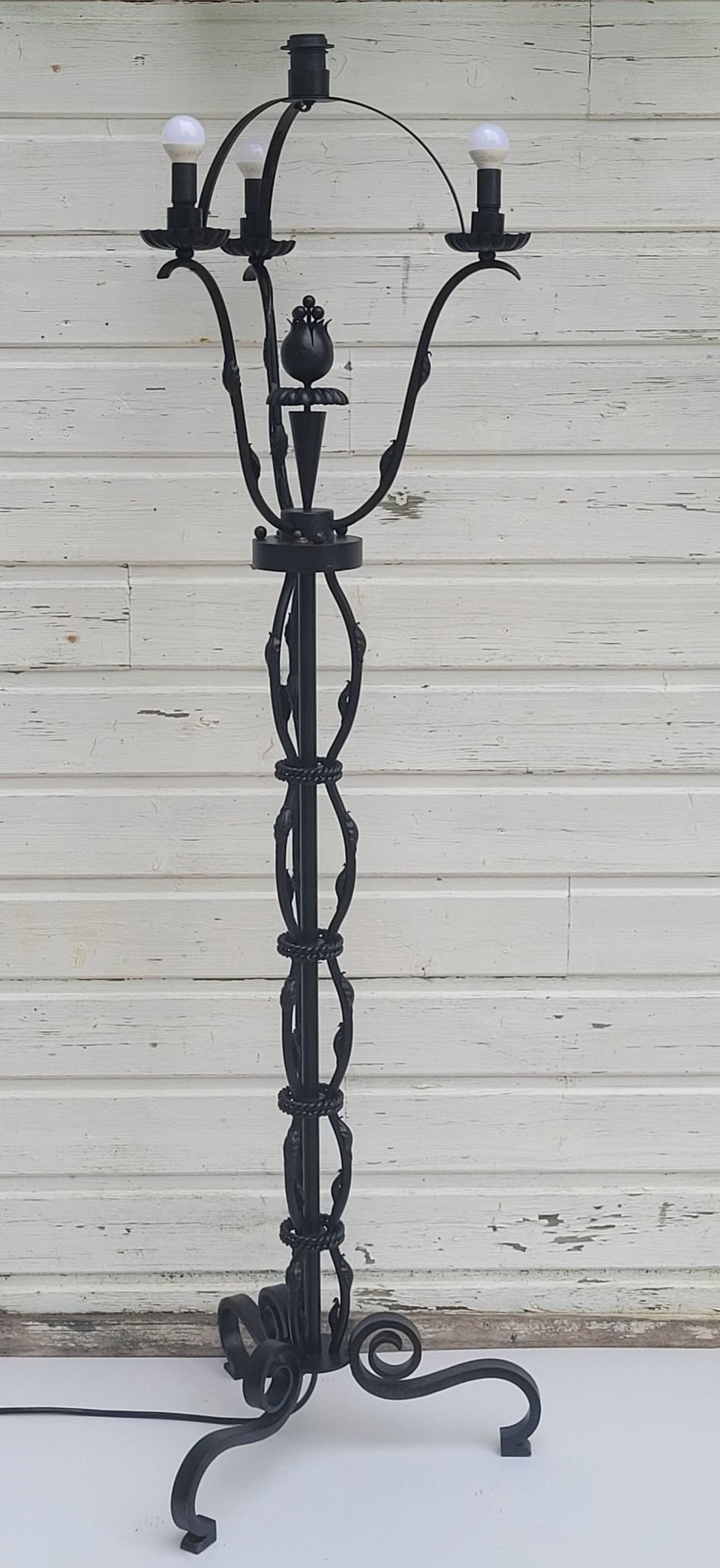 Black wrought iron floor lamp attributed to Gilbert Poillerat