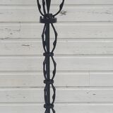 Black wrought iron floor lamp attributed to Gilbert Poillerat