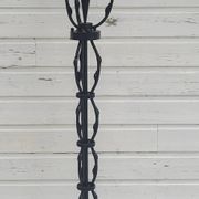 Black wrought iron floor lamp attributed to Gilbert Poillerat