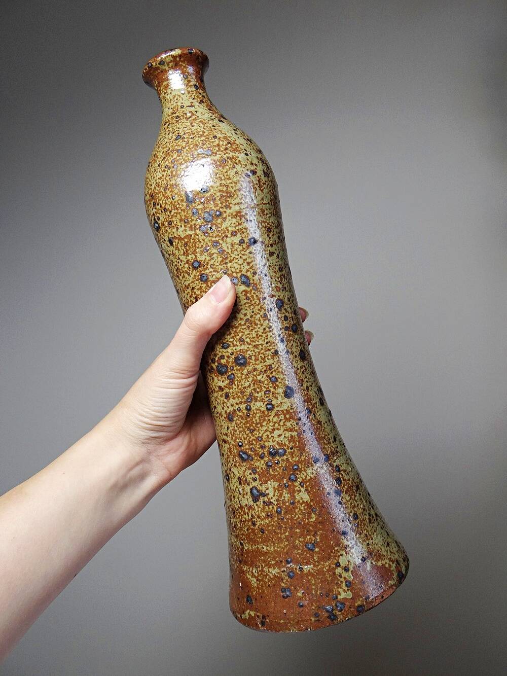 Tall bottle or soliflore in vintage handcrafted enamelled pyrite stoneware from the 60s and 70s