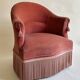 Pink-orange velvet tub chair