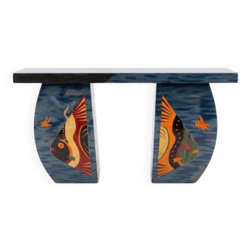An Art Deco console made of beech wood and blue marquetry.