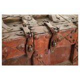 Large wooden and metal chest with red patina