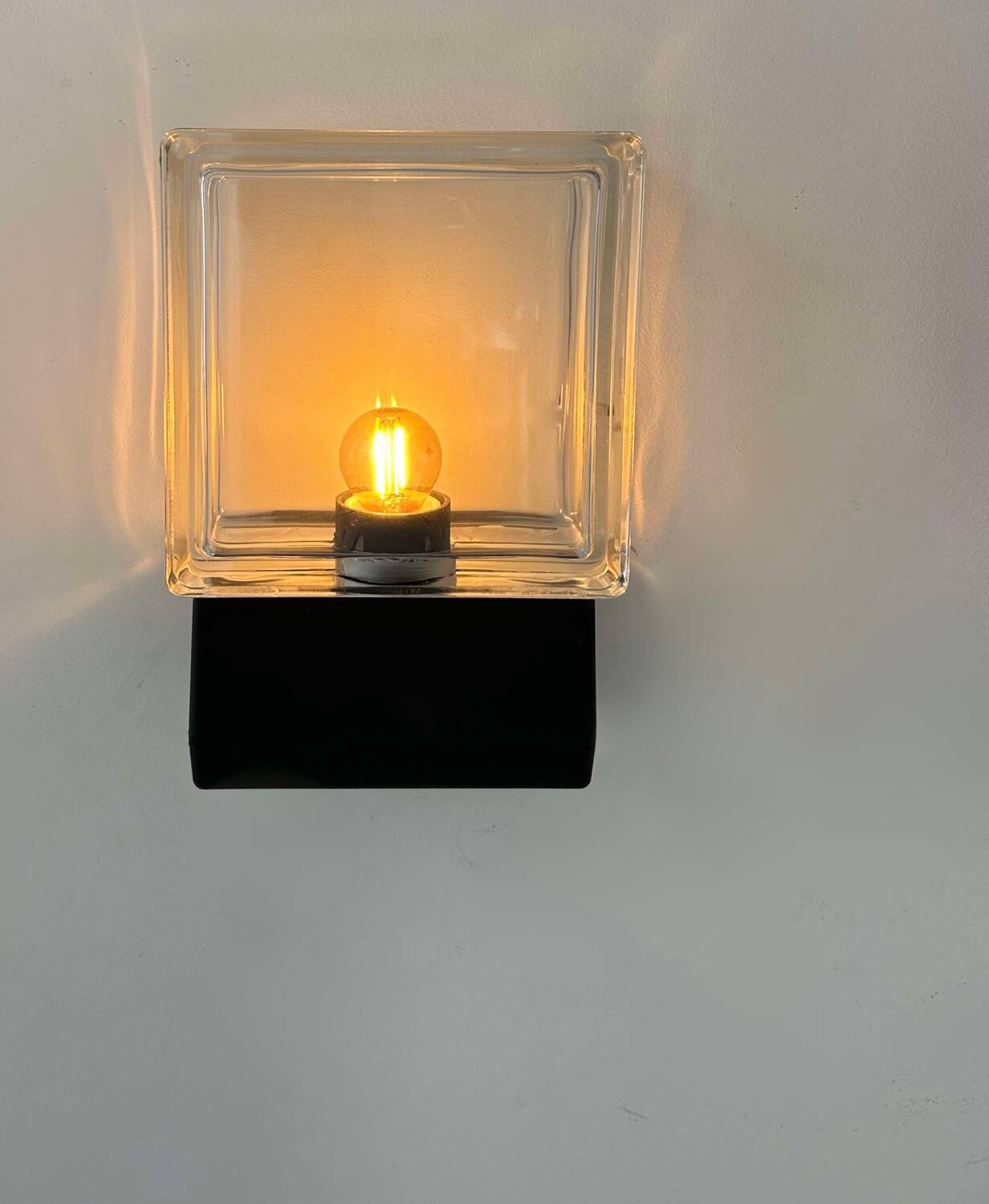 Pair of vintage wall lights, glass and black metal, Italy 1980