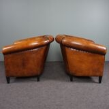 Set of 2 club chairs in black piping sheep leather