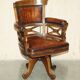 Victorian captain's chair in leather restored by Cornelius V Smith.