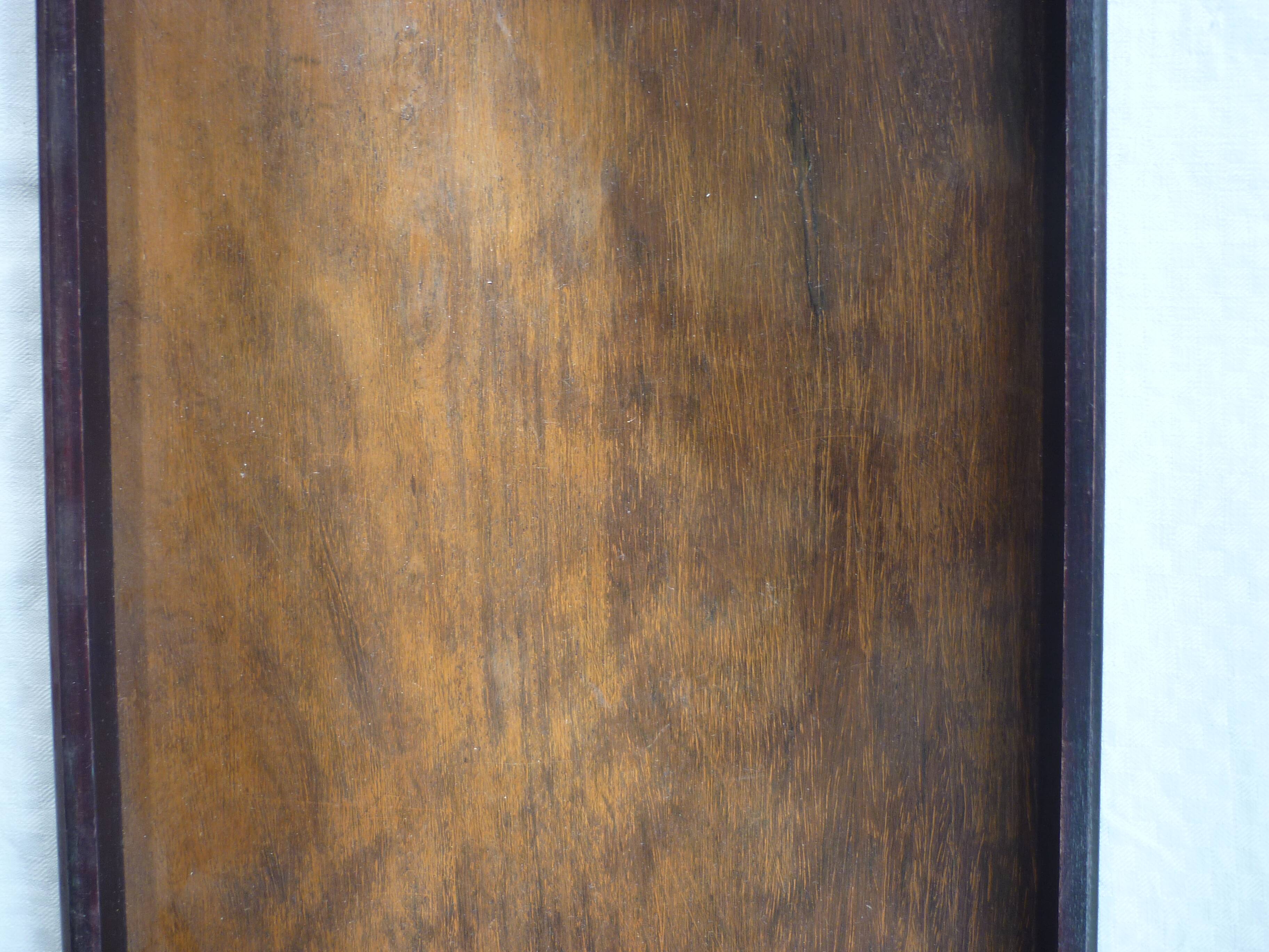 Wooden tray metal fists