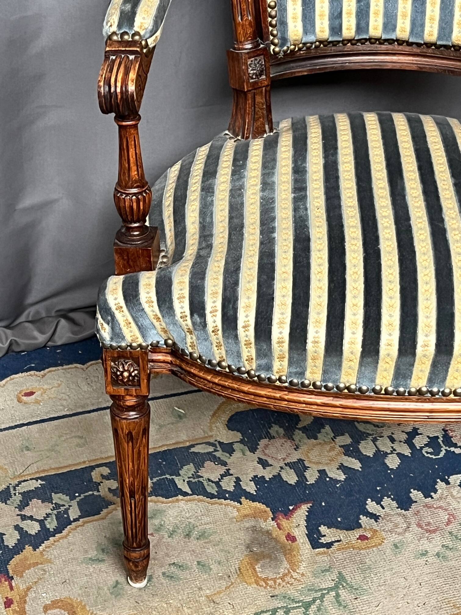 Antique Louis XVI style armchair.