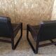 Pair of vintage armchairs in curved wood with suspended seat circa 1970-80.