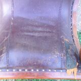 Fauteuil  à crosse assise en cuir