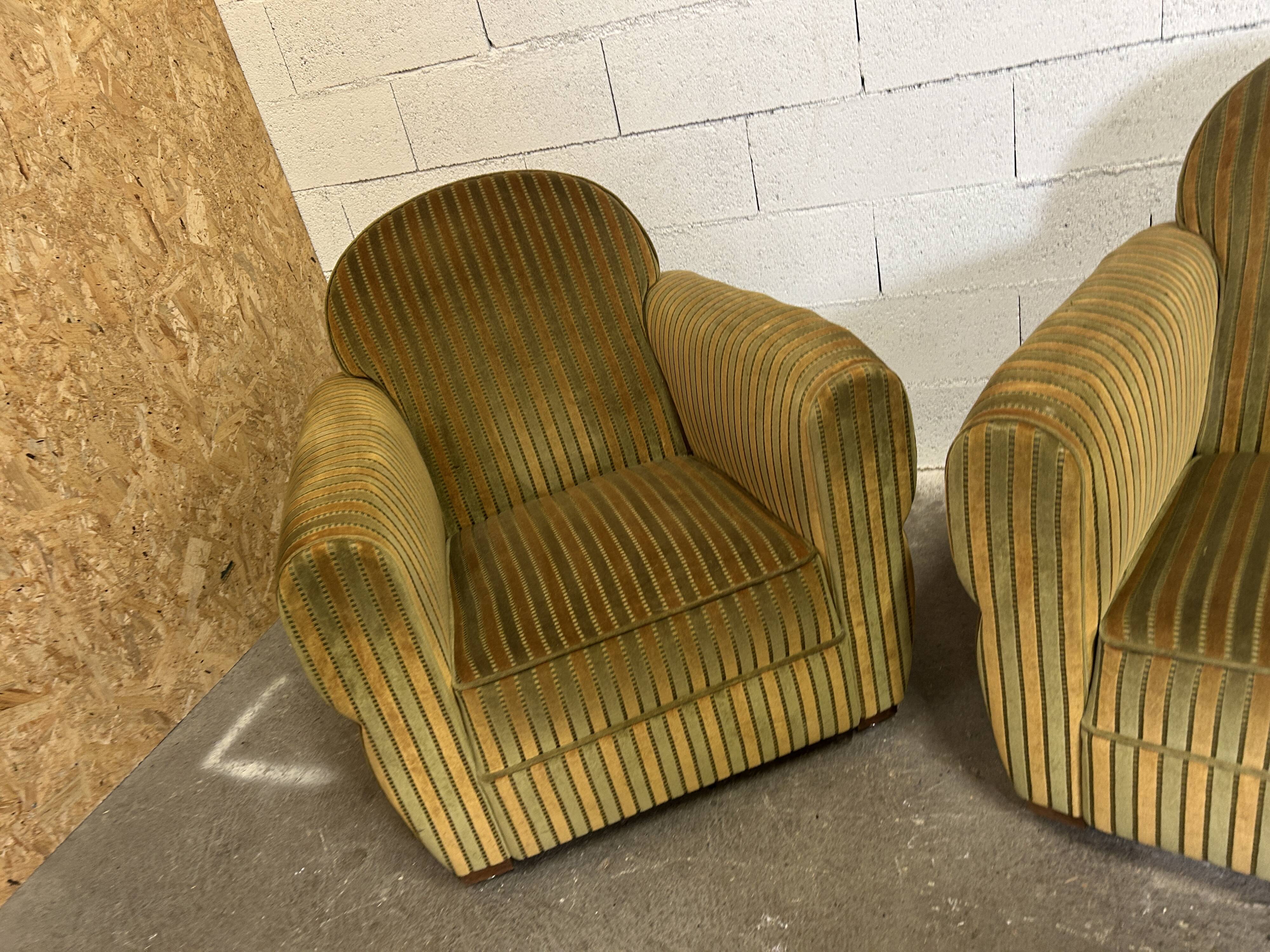 Pair of green fabric armchairs