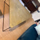 Triangular gilded metal coffee table