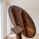 Antique wooden guéridon with a tilting top.