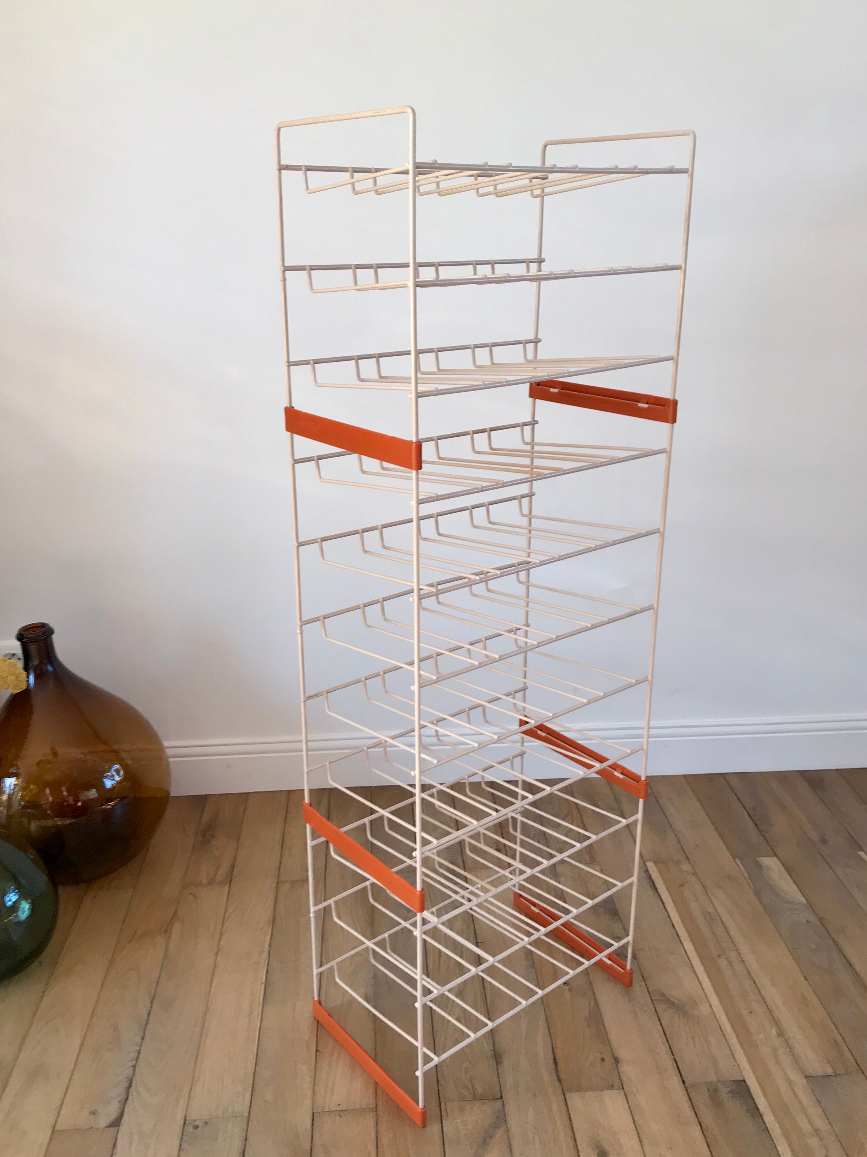 White and orange industrial shelf brand "caddie" 50s