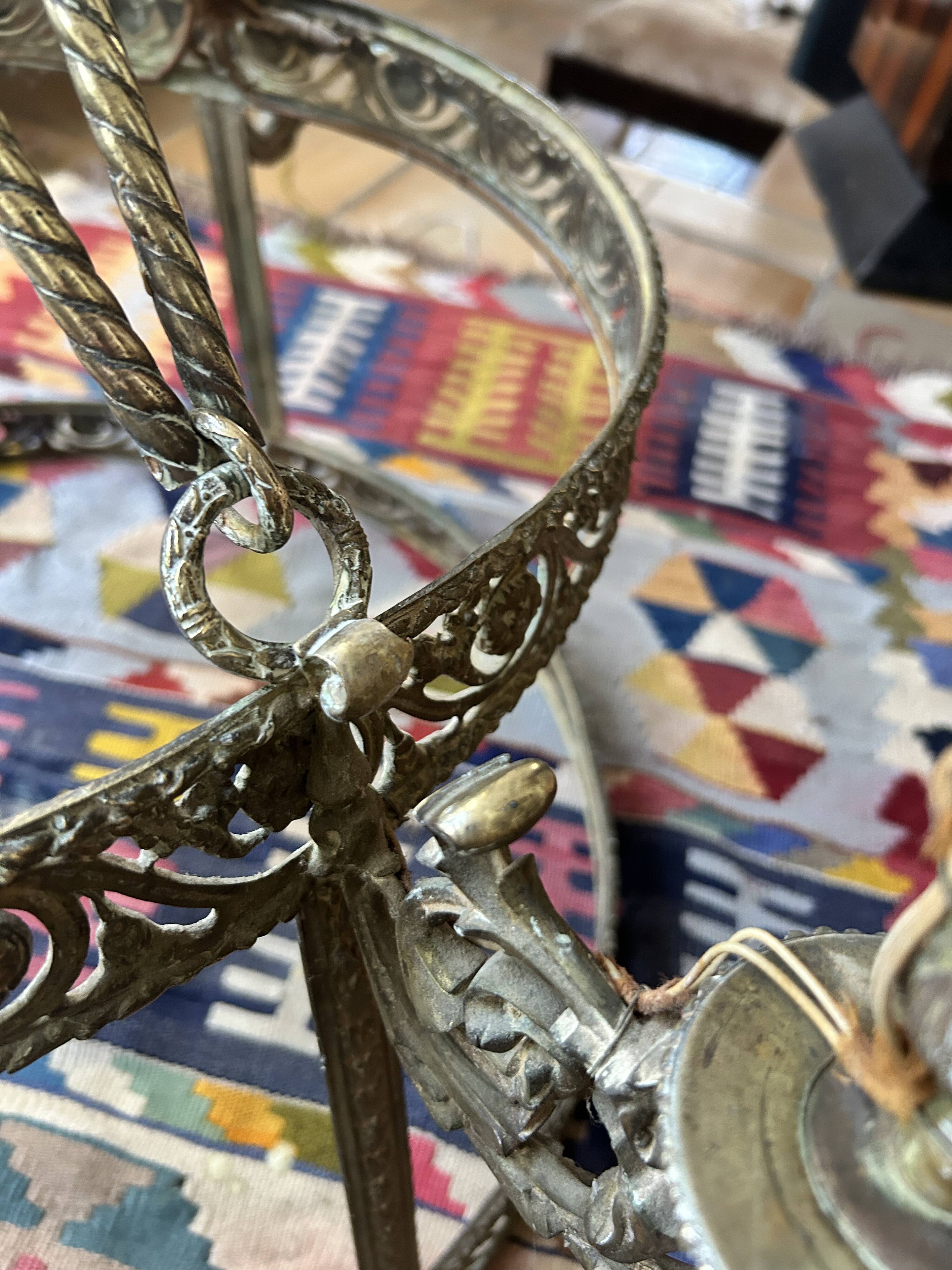 Brass chandelier from the early 20th century.