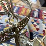 Brass chandelier from the early 20th century.